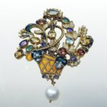 An Austro-Hungarian gilt multi-gem and enamelled brooch, in the form of a basket of flowers,