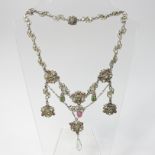 An ornate Austro-Hungarian gilt and multi gem set pendant necklace,