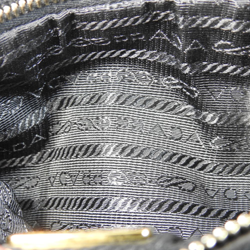 *Withdrawn* A Prada black leather clutch bag, 21cm, together with a Christian Dior cream clutch bag, - Image 11 of 34