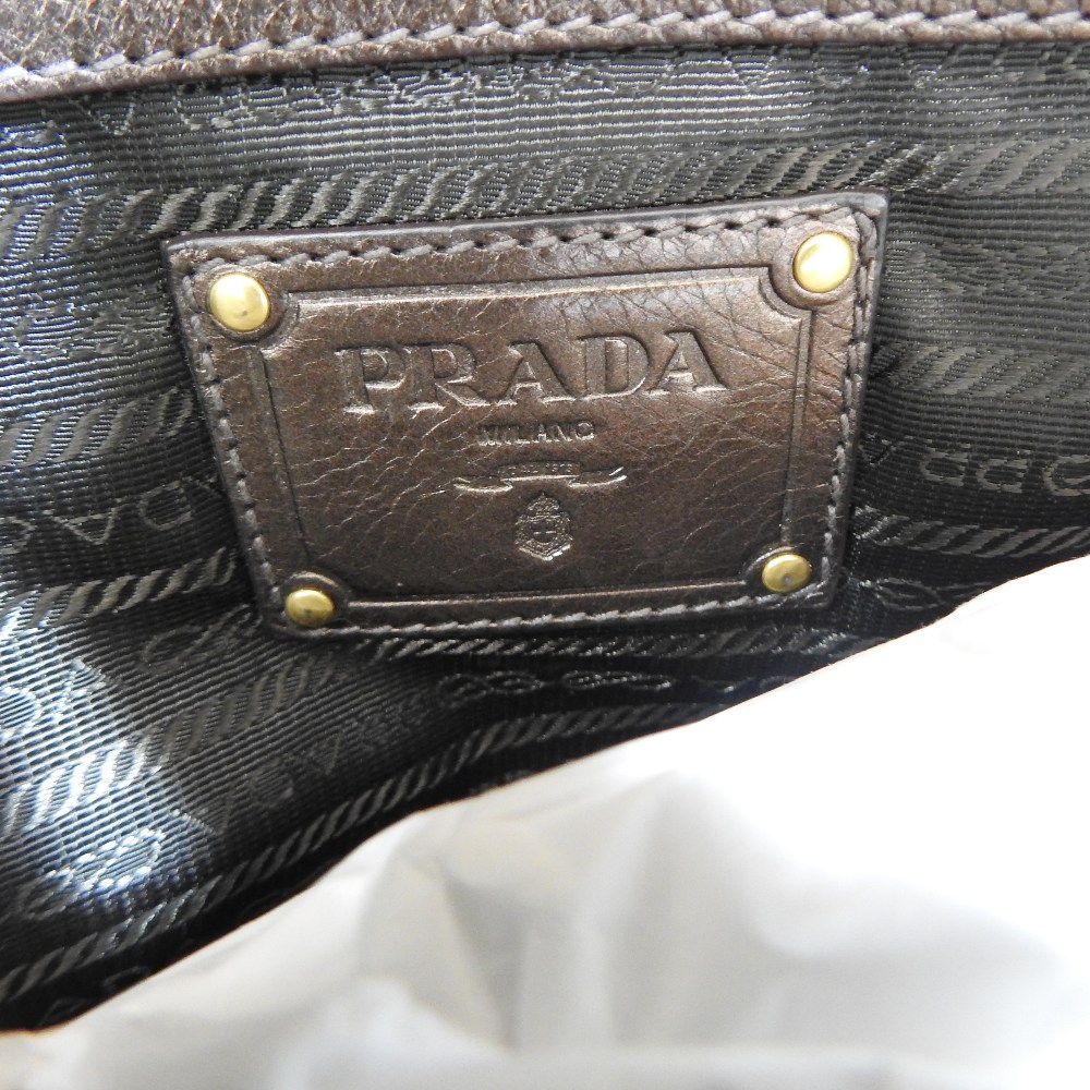 A Prada metallic brown leather designer handbag, - Image 6 of 6