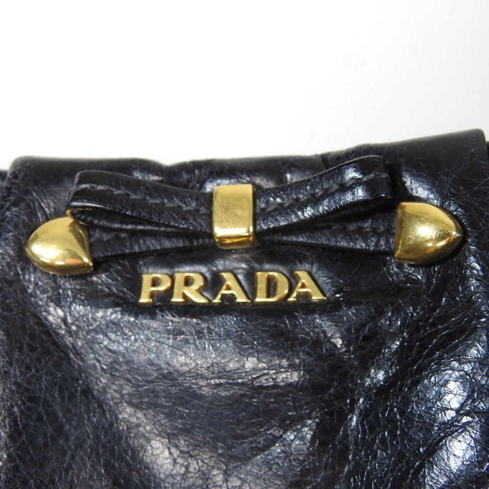 *Withdrawn* A Prada black leather clutch bag, 21cm, together with a Christian Dior cream clutch bag, - Image 13 of 34