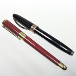 A Visconti Michelangelo black and gilt ball point pen, 14cm long,