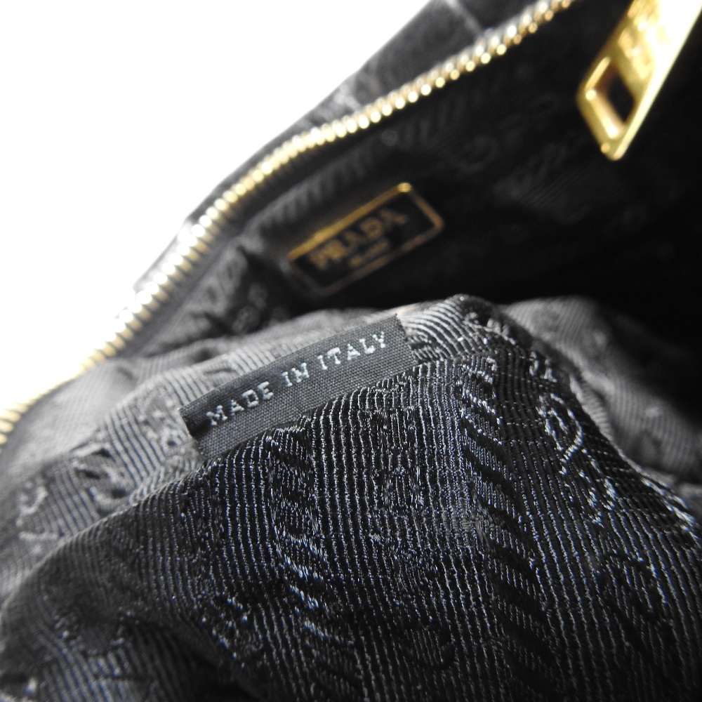 *Withdrawn* A Prada black leather clutch bag, 21cm, together with a Christian Dior cream clutch bag, - Image 6 of 34