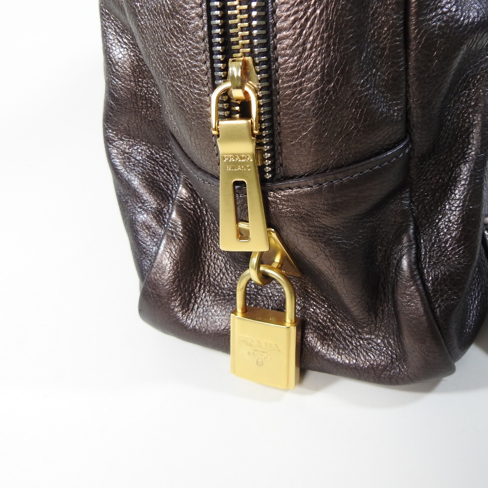 A Prada metallic brown leather designer handbag, - Image 5 of 6