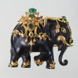 An Indian carved ebony and 18 carat gold mounted diamond and multi gem cabochon set brooch,