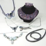 A Swarovski purple crystal necklace and matching bracelet,