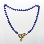 A lapis lazuli single row bead necklace,