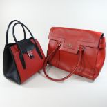 A Michael Kors red and black leather handbag, 27cm,