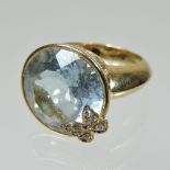 A large Carrera y Carrera 18 carat gold blue topaz collet set ring,