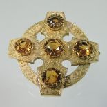 A 15 carat gold and citrine set ladies five stone brooch, in the form of a Celtic cross,