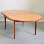 A 1960's G Plan teak extending dining table,
