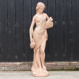 A reconstituted stone garden figure of a classical lady,