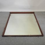 A large late Victorian mahogany framed wall mirror,