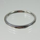 A platinum ring, of plain design, size Q, 3.