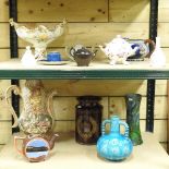 A shelf of pottery, to include a Brannam pottery vase and a stoneware jar,