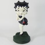 A modern painted metal Betty Boop doorstop,