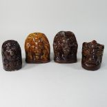 Four various 19th century Staffordshire treacle glazed sash window stands,