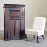 A George III oak hanging corner cabinet, 72cm,