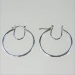 A pair of platinum hoop earrings, 2.5cm drop, 3.