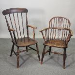 A 19th century elm seated high back open arm chair,