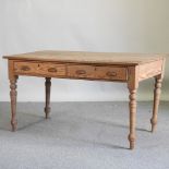 A Victorian pine dining table,