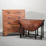 An Edwardian satin walnut chest of drawers, 92cm, together with a drop leaf table, a cutlery table,