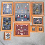 A large collection of Naval badges,