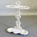 A white painted stick stand,