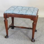 A George III style blue upholstered footstool, 52cm,