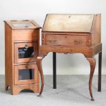An early 20th century mahogany bureau, on cabriole legs, 61cm, together with a small glazed cabinet,