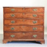 A George III oak chest of drawers,