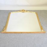 A gilt framed over mantel mirror,