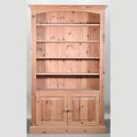 A modern pine open bookcase,