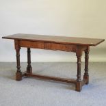 A 17th century style oak side table, of narrow proportions,