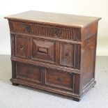A continental oak chest of drawers,