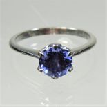 A platinum and tanzanite ring, approximately 1.5 carats, size Q, 4.