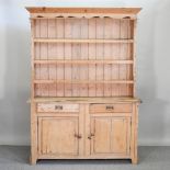 A 19th century stripped pine dresser,