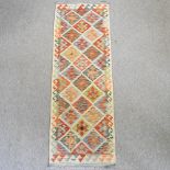 A kelim runner, with diamond pattern,