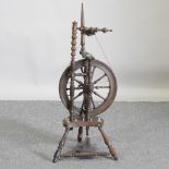 A 19th century Welsh spinning wheel,