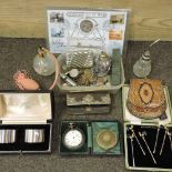 A collection of items to include silver plate, coins, a pocket watch, scent bottles,