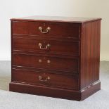 A reproduction chest, containing two deep drawers,
