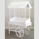 A vintage style white painted wooden market traders cart,