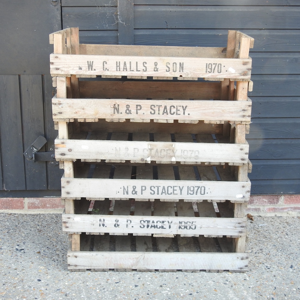 A collection of wooden fruit trays,