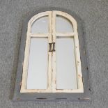 A painted wooden shutter mirror,