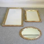 An ornate wall mirror, 137 x 75cm,