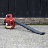 A petrol driven garden leaf blower