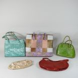 A collection of ladies fashion handbags