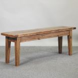 A rustic pine bench,