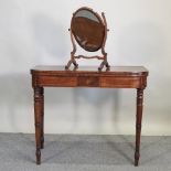 A George III mahogany and inlaid folding tea table, 91cm,