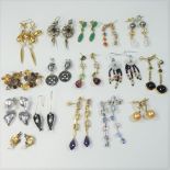 A collection of ladies designer earrings, to include coloured gem drop earrings and other pearl,